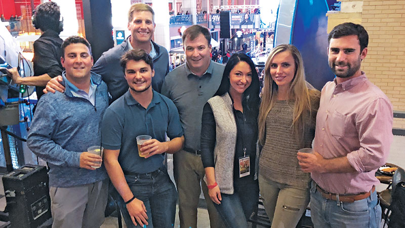 Nothing but a good time Left to right, Payton Turner, SingleOps; Lanier Milner, SingleOps (behind); Alex Smith, SingleOps (front); Casey Hurd, Greenscapes Land Care; LM’s Chloe Scoular; Emily Traxler, SingleOps; and Sean McCormick, SingleOps. Photo: LM Staff