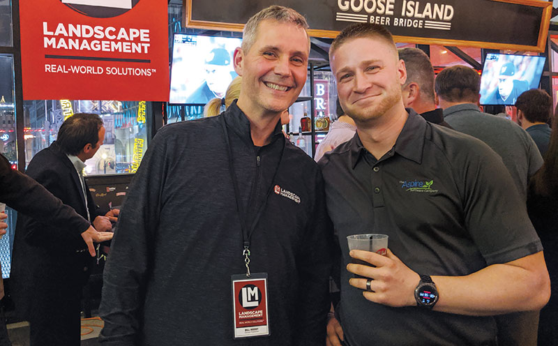 Aspirations of a good time LM Publisher Bill Roddy (left) and Gage Roberts of The Aspire Software Co. agreed that The Crashers’ cover of Journey’s “Don’t Stop Believin’’’ was worth the price of admission. LM Staff