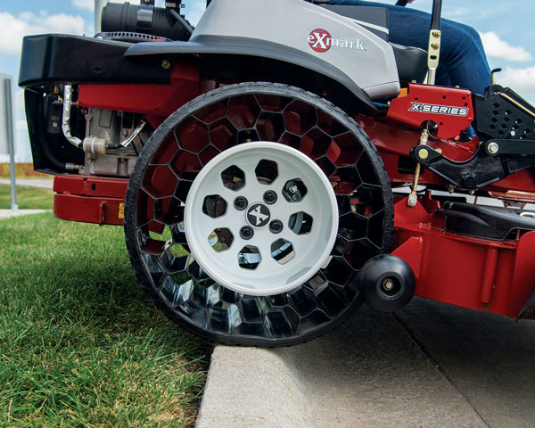 MORE MOW TIME Airless radial tires help eliminate downtime on mowers and reduce many maintenance costs. (Photo: Exmark)