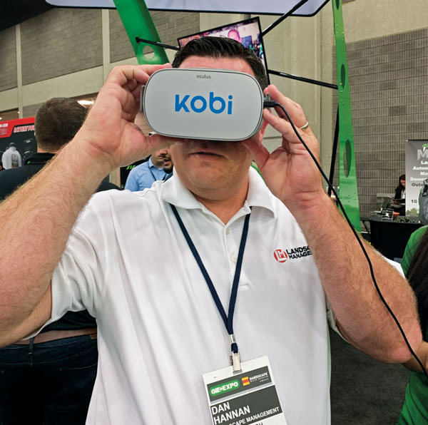 Virtual reality Dan Hannan, LM eastern regional sales manager, tries out the virtual reality vision system by Mean Green and Kobi for Mean Green’s new 74-inch Evo autonomous mower during GIE+EXPO. (Photo: Christina Herrick)