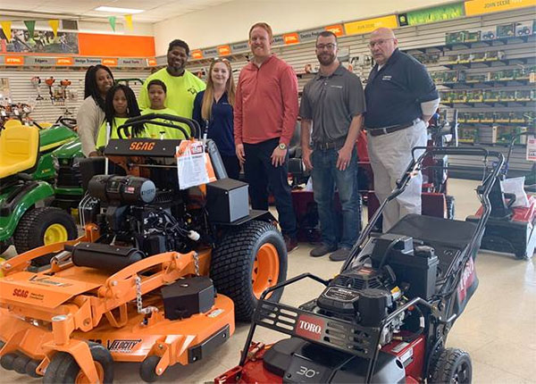 Landeros Reid and family, along with representatives from Kohler, Medart, and Lawn & Leisure. (Photo provided by Kohler)