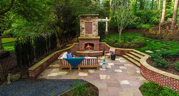 Custom stone and brick fireplace (Photo: Joel Hordyk, Cameron Street Photography)