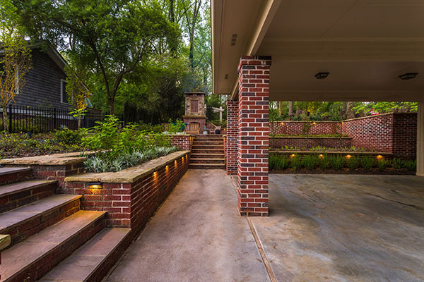 Brick walls and stone steps in backyard (Photo: Joel Hordyk, Cameron Street Photography)