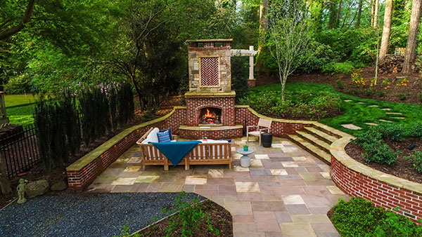 Custom stone and brick fireplace (Photo: Joel Hordyk, Cameron Street Photography)