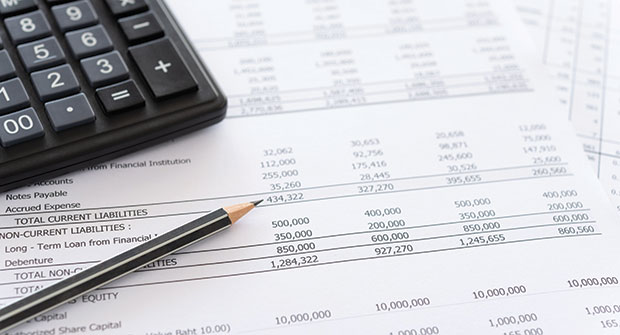 Tax papers and calculator (Photo: utah778/iStock / Getty Images Plus/Getty Images)