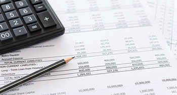 Tax papers and calculator (Photo: utah778/iStock / Getty Images Plus/Getty Images)