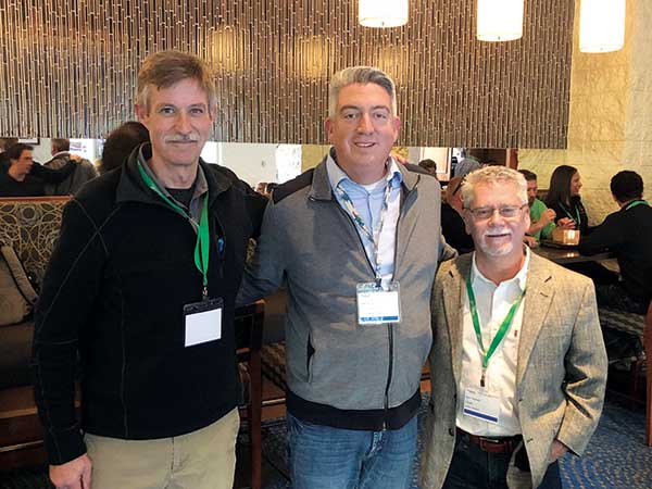 Envisor Consulting’s Ben Gandy (left) and Ken Thomas with Seth Jones (middle). (Photo: LM Staff)