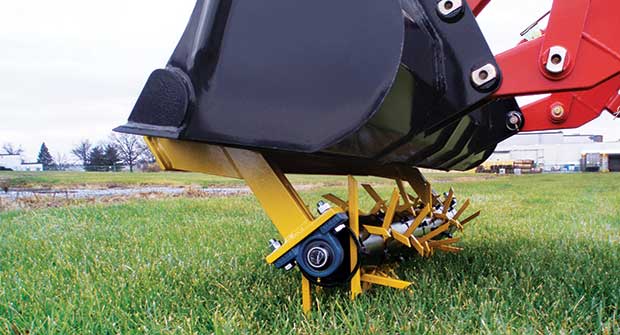 Aerator tines in action (Photo: Earth & Turf)