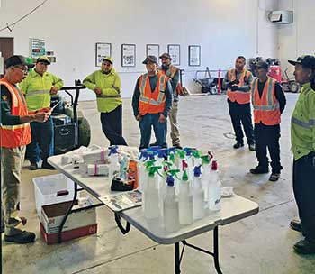 Company meeting spaced apart (Photo: Landscape Development Inc.)