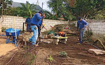 Team laying drip irrigation (Photo: Enviroscape L.A.)