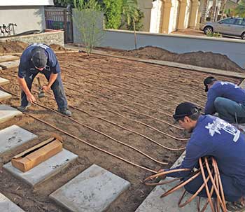 Team laying drip irrigation (Photo: Enviroscape L.A.)