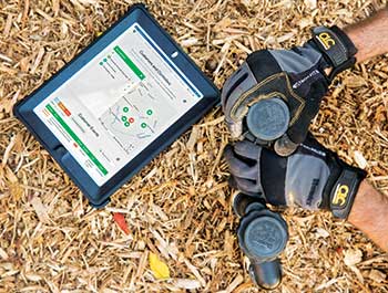Irrigation tech adjusting fixtures (Photo: Hunter Industries)