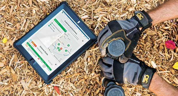 Irrigation tech adjusting fixtures (Photo: Hunter Industries)