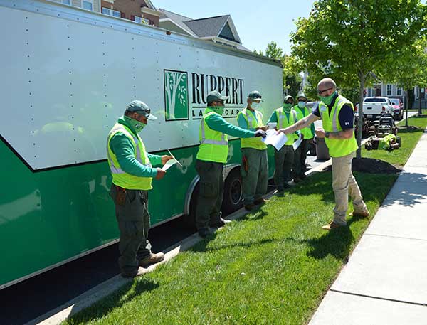 Ruppert front-line field workers receive bonus checks. (Photo: Ruppert Landscape)