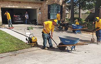 Grounds Guys crews performing work (Photo: The Grounds Guys of League City)