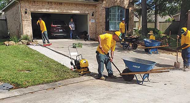 Grounds Guys crews performing work (Photo: The Grounds Guys of League City)