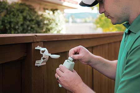 Tech setting up a sensor (Photo: Rain Bird Corp.)