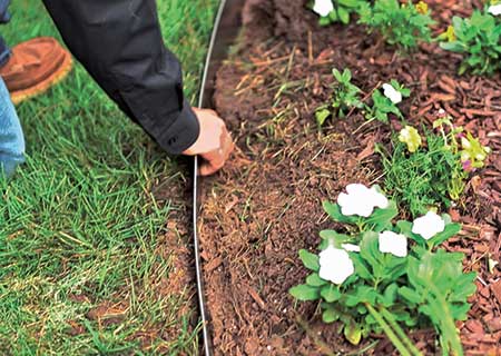 Checking landscape edging (Photo: Coyote Landscape Products)