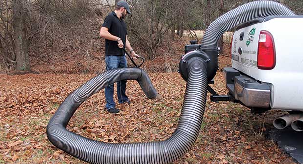 Person performing fall cleanup (Photo: Peco)
