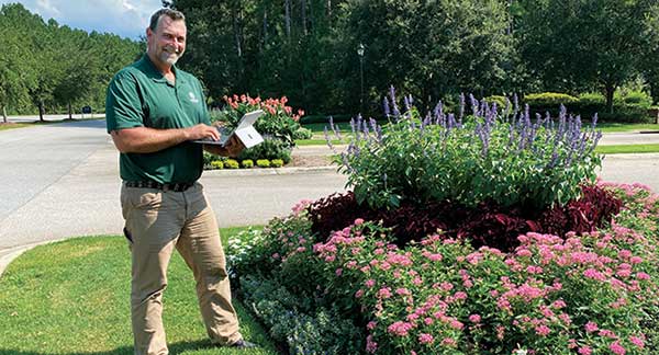 Tech in the field using software (Photo: The Greenery)