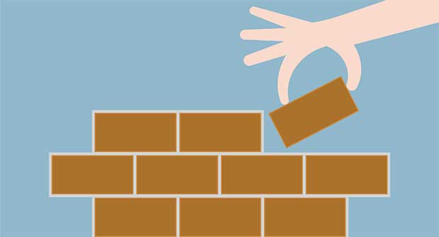 Laying brick foundation (Photo: lekkyjustdoit / iStock / Getty Images Plus)