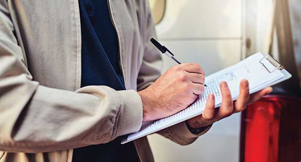 Person filling out checklist (Photo: Charday Penn/E+/Getty Images)