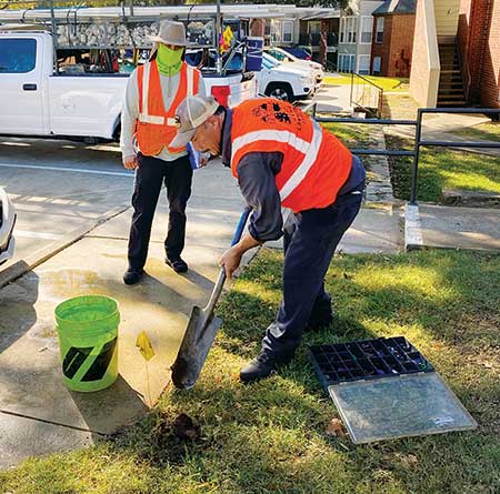 Crew members installing irrigation (Photo: Earthworks)