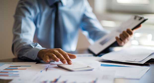 Person doing finances (Photo: ridvan_celik/E+/Getty Images)