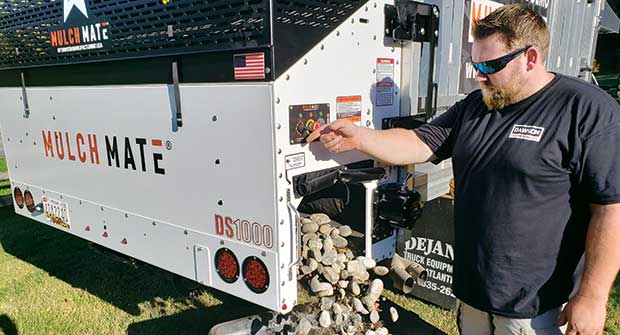 Handling material using Mulch Mate equipment (Photo: Mulch Mate)