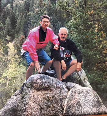 In a treasured photo with his dad, Jones sports a bold fashion choice. (Photo provided by LM Staff)