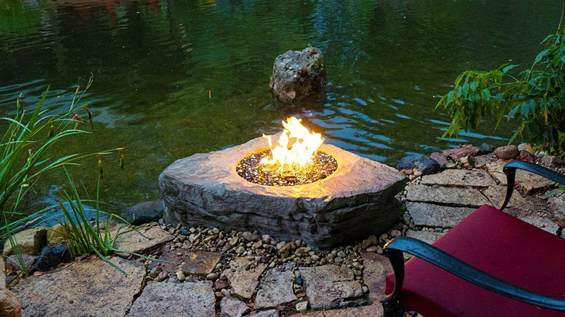 Aquascape's Faux Stone Fire Pit is constructed of glass fiber reinforced concrete. (Photo: Aquascape)