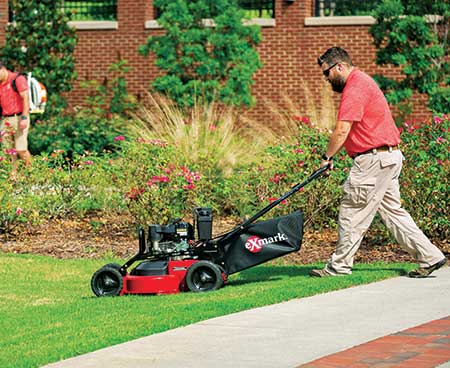 Person using Exmark mower (Photo: Exmark)