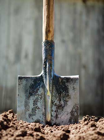 Shovel in dirt (Photo: onecooltree/iStock / Getty Images Plus/Getty Images)