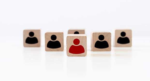 Game pieces with images of people (Photo: Demianastur / iStock / Getty Images / Getty Images Plus)