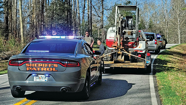 Police apprehend the suspect who stole a mini excavator from one of LDC Groups’ job sites in Lula, Ga. (Photo courtesy of LDC Groups)