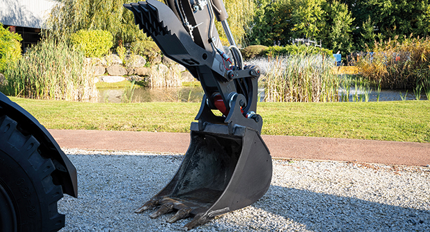 Mecalac offers a new hydraulic thumb option for select 6MCR and 7MWR models, making it easy to pick up, maintain and move large or long objects. (Photo courtesy of Mecalac)