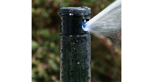 When installing irrigation systems, be sure the lines are compacted and the sprinklers are installed to grade. (Photo courtesy of Jain Irrigation)