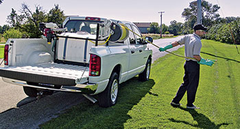 Man operating spray rig (Photo: Hannay Reels)