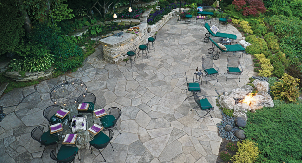 While the terrace garden serves as a space for entertaining, the real function of the patio is to capture and manage stormwater to prevent the erosion of the bluff that the property overlooks. (Photo courtesy of Kimber Johnson)