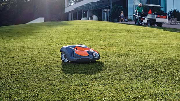 Mowin’ on its own: Robotic mowers can save companies on labor. Additionally, low noise output ensures no one is disturbed. (Photo: Husqvarna)