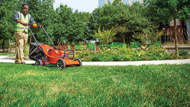 Clean it up: Smaller push mowers are ideal for items such as cleaning up around flower beds and curbs. (Photo: Husqvarna)