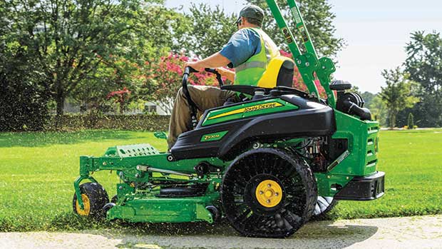 Wide load: Ride-on mowers often tout larger deck sizes to get more done in a single cut. (Photo: John Deere)