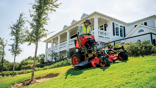 Squeeze in: Stand-on mowers take up a smaller footprint and can mow in tight spaces. (Photo: Kubota)