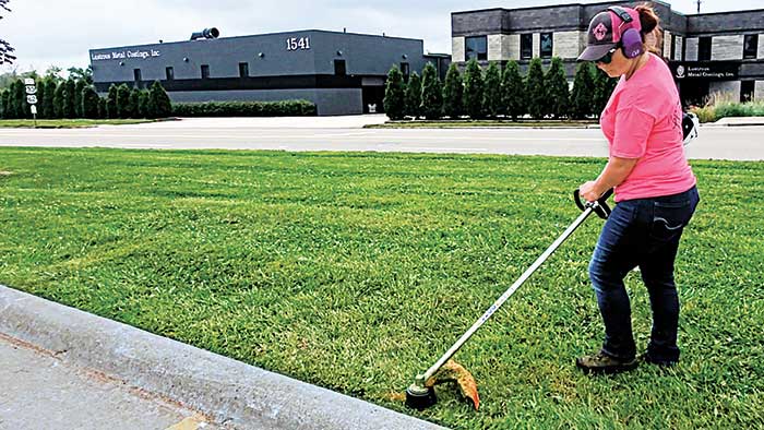 Before purchasing a trimmer, think about operator comfort and how and where the trimmer will be used. (Photo: Spencer’s Lawn Care)
