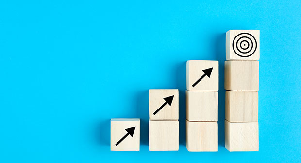Stair-step blocks leading up to target (Photo: cagkansayin / iStock / Getty Images / Getty Images Plus)