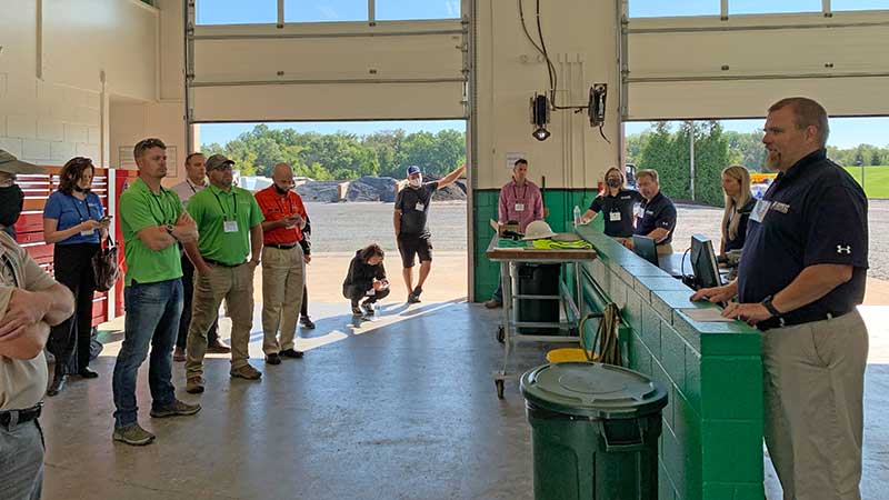Lauren Dugan, David Saunders and Adrian Karver discuss Ruppert Landscape's safety protocols. (Photo: LM Staff)