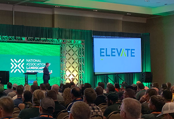 NALP CEO Britt Wood unveils the new name for NALP's Landscapes Conference: Elevate Expo. (Photo: LM Staff)