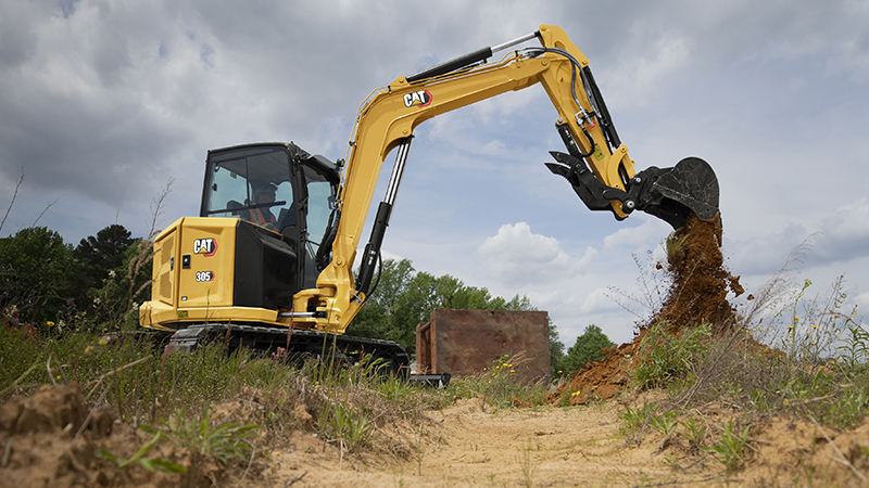 The compact radius swing of Cat's 305 CR reduces overhang when working to the side. (Photo: Cat)