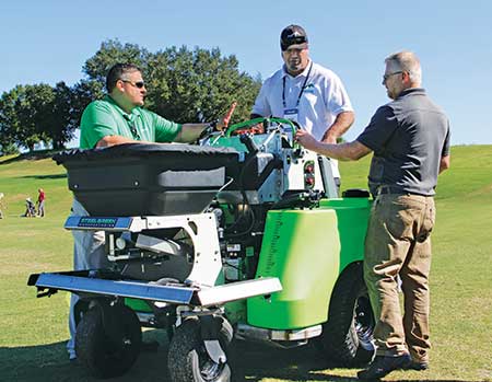 Matt Smith of Steel Green (left) says he’s happy to see demand for the company’s equipment, but worried they won’t be able to satisfy the demand. (Photo: LM Staff)