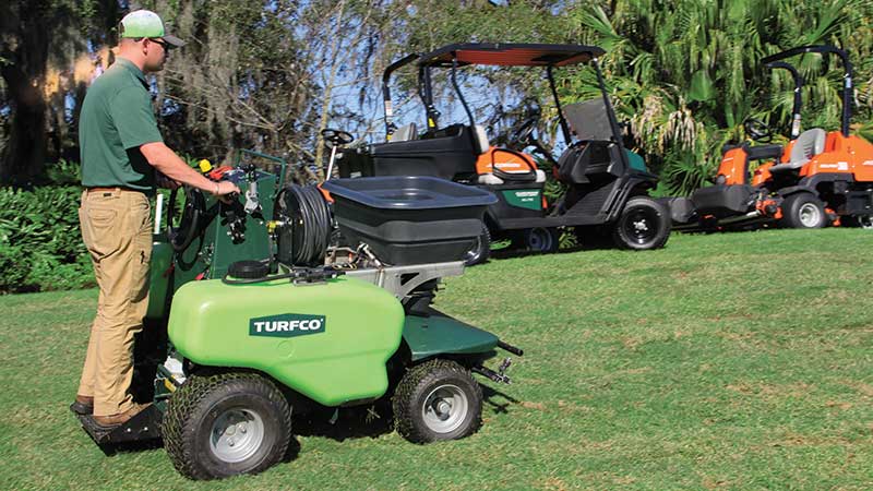 John Kinkead, southern regional sales manager, Turfco, took advantage of a steep slope near their outdoor demonstration area to show off the capabilities of their spreader-sprayers to attendees of the LM Growth Summit. (Photo: LM Staff)